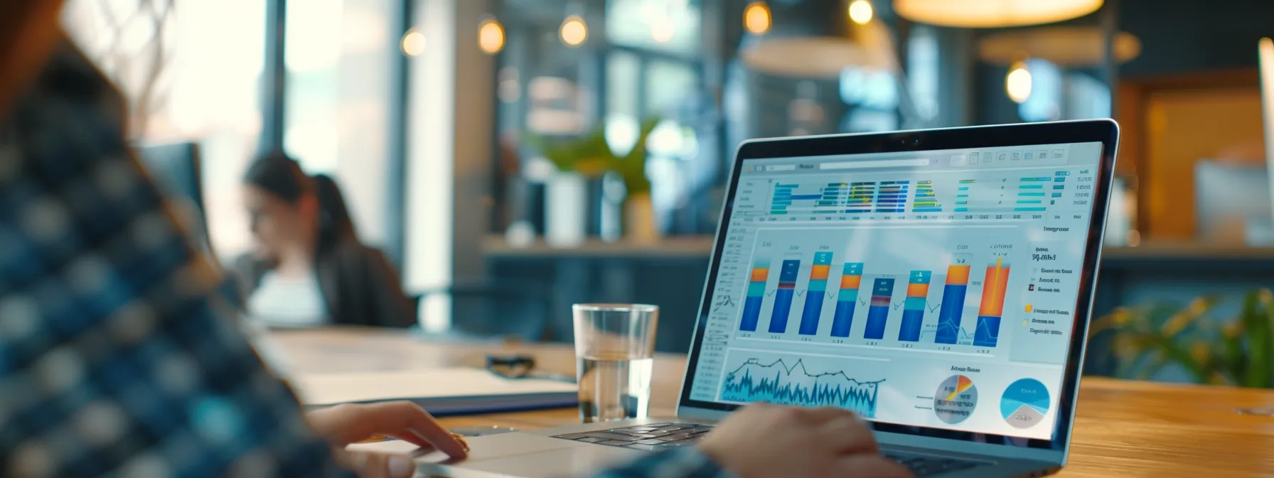 a focused office setting captures a professional analyzing fluctuating energy bills on a modern laptop, surrounded by colorful charts displaying energy consumption trends and highlighted areas indicating potential system inefficiencies.